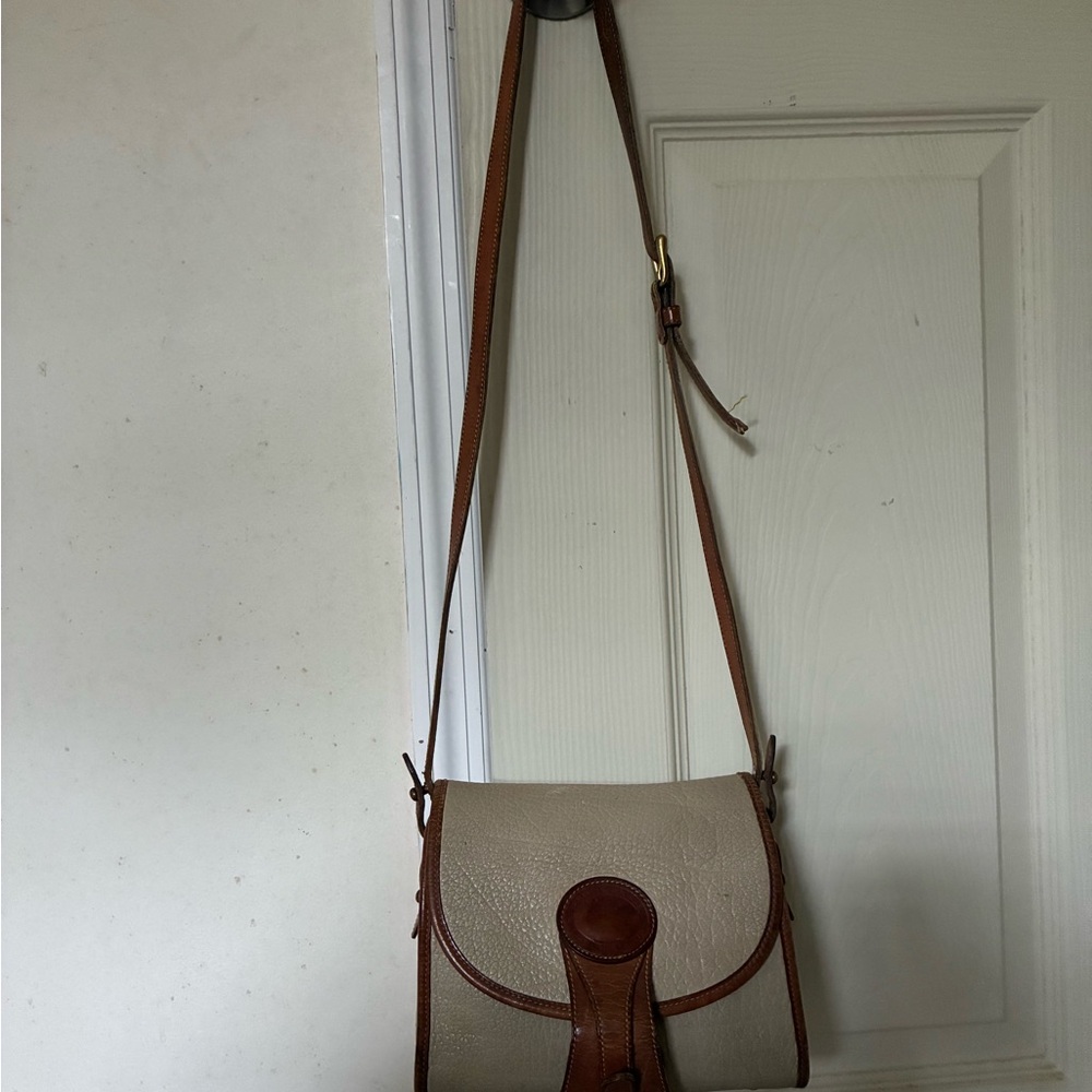 Dooney & Bourke Leather-Trim Crossbody Saddle Bag in Beige and Brown